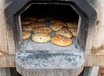 Fresh tasty healthy and delicious homemade olive pies cooked on the traditional clay oven in at a