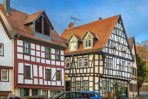 Street with historic half-timbered houses in Gelnhausen, Germany, Europe