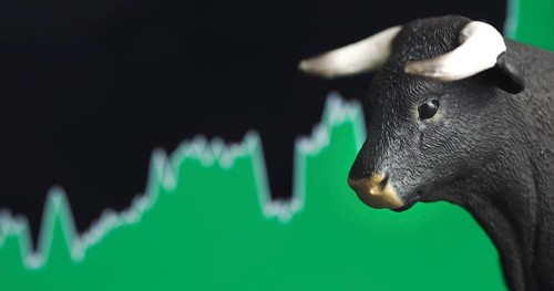 Stock price rise with green chart bullish top in background and bull in front. Market trend concept