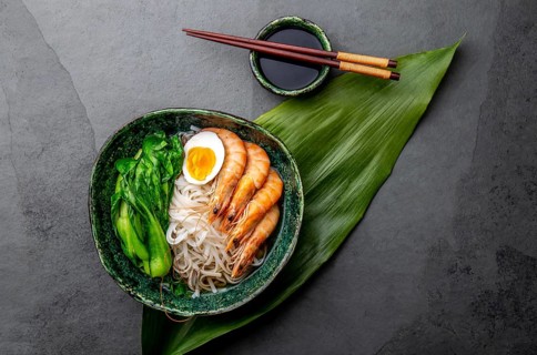 Food, Asian rice noodles with shrimps on gray background