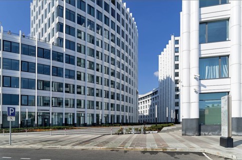 Moscow, Russia, July 18, 2021: Modern office building with arcuate facade. Ozerkovskaya embankment,