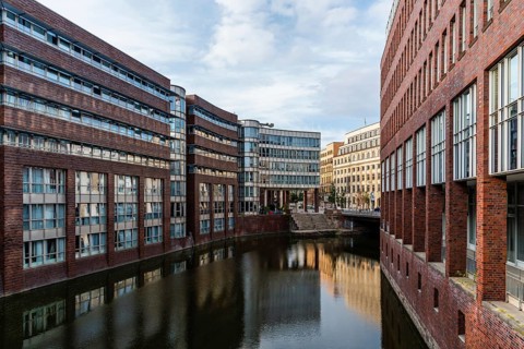 Hamburg, Germany, August 4, 2019: Scenic view of Bleichenfleet Canal in Hamburg view at sunset,
