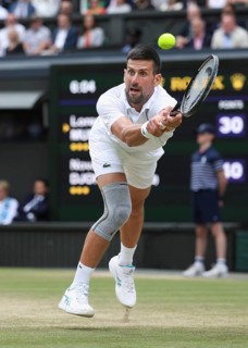 Serbian tennis player Novak Djokovic in action at the 2024 Wimbledon Championships, London,