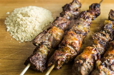 Juicy meat barbecue skewer (Churrasquinho, espetinho) in close up