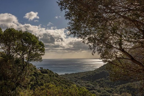 View of the glittering sea and Monte Ferru, Ogliastra, Sardinia, Italy, Europe
