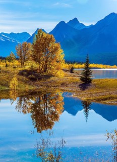 Sunny autumn day in the Rocky Mountains of Canada. The concept of ecological and active tourism.