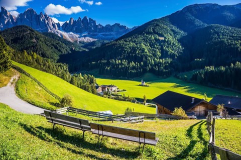 Picturesque Val di Funes. Sunny autumn day in Dolomites, Tirol. Rocky peaks and forested mountains
