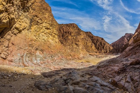 Israel in January. Picturesque and multi-color Black canyon in ancient Eilat mountains