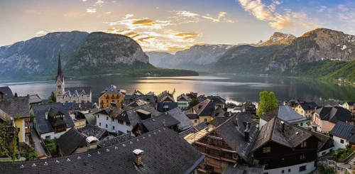Hallstatt Austria, sunrise panorama nature landscape of Hallstatt village with lake and mountain