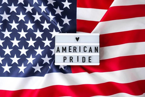 American flag. Lightbox with text AMERICAN PRIDE Flag of the united states of America. July 4th