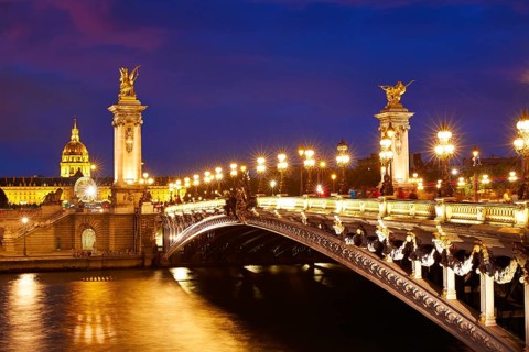 Pont Alexandre III in Paris France sunset over Seine river