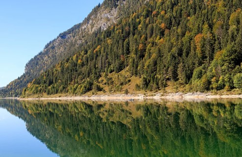 Mirror image at the Sylvenstein reservoir near Lenggries, Upper Bavaria