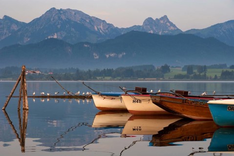 Boats in lake Hopfensee near Hopfen am See in the German state Bavaria