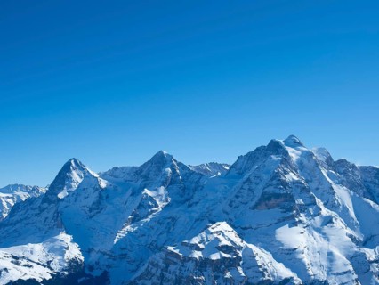 View from the peak of Schilthorn in the skiing resort of Muerren, Switzerland, on a beautiful