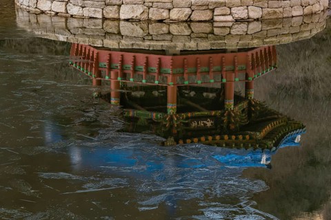 Jeongeup-si, South Korea. December 8, 2020: Reflection in water of picnic pavilion with blue roof