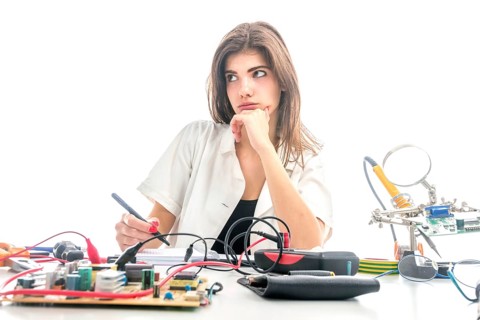 Woman Repairing Computer Part, Service Center, Electronics Repair Service
