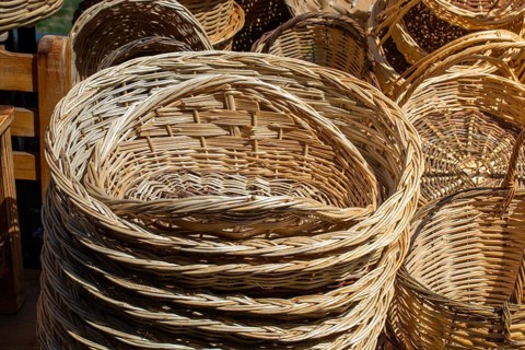 Empty wicker baskets are seein a market place
