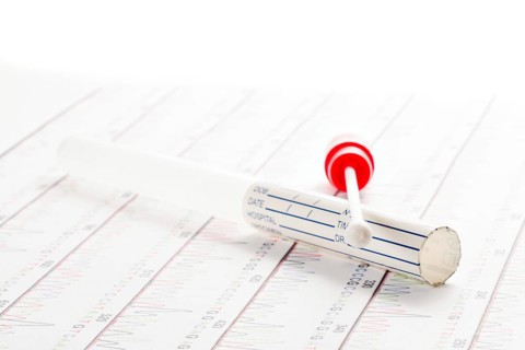 DNA test tubes and cotton swabs, wipe test