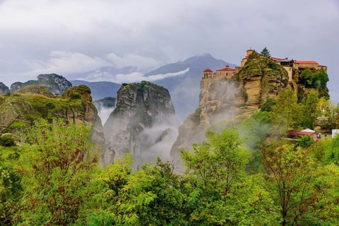 Monastery of Varlaam in the fog, the second largest Eastern Orthodox monastery in Meteora, Greece,