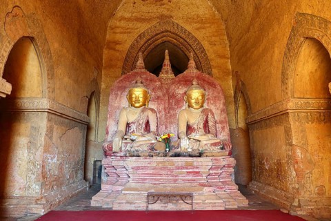 Buddha statue inside ancient Buddha statue inside of old Temple at Bagan Kingdom, Myanmar (Burma)