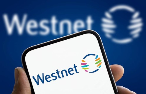 Westnet logo is displayed on smartphone. Westnet is a Perth-based Australian telecommunications