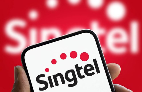 Singtel logo is displayed on smartphone. Singtel, is a Singaporean telecommunications conglomerate