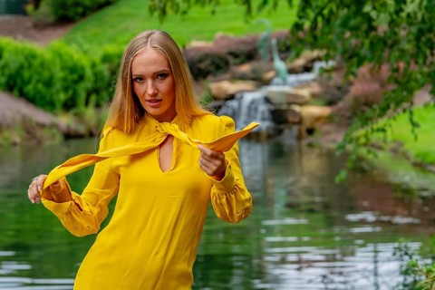 A Beautiful Blonde Model Poses Outdoors In Her Fall Clothes, Charlotte, United States of America