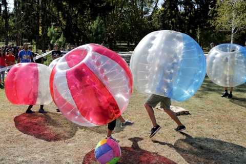 Sofia, Bulgaria - September 24, 2016: Boys are playing bubble football game in the park