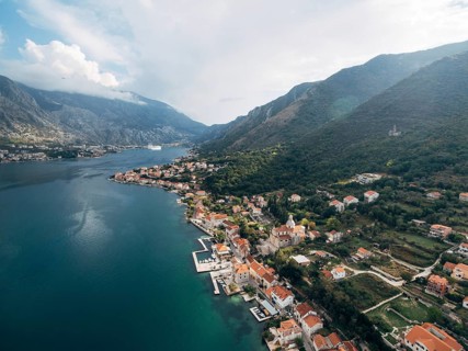 Aerial view of the town of Prcanj on the shore of the Bay of Kotor.