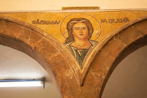 Madaba, Jordan, November 5, 2022: Interior walls of Greek Orthodox church of St George, known by