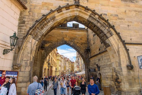 The arch between Charles Bridge and the old town in Prague, Czech Republic, Europe