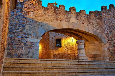 Caceres Arco de la Estrella Star arch sunset in Spain entrance to monumental city