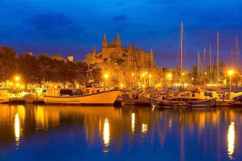 Palma de Mallorca sunrise with Cathedral and port in Majorca Balearic islands of spain
