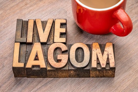 Live lagom word abstract in vintage letterpress wood type blocks, Swedish balanced lifestyle