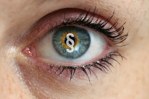 Eye with paragraph in the pupil concept