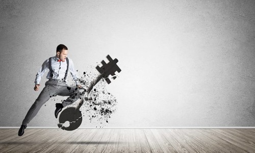 Breaking through access concept with furious man in room crashing concrete key