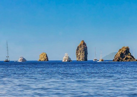 Faraglioni, Pietra Lunga and Pietra Menalda rock formations off the island of Lipari in Sicily,