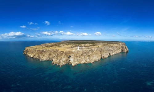 Aerial landscape view of Cap de Barbaria and the landmark lighthouse on Formentera Island