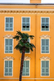 The typical facades of a traditional townhouse in Nice (Nizza), Cote d'Azur, Alpes-Maritimes, PACA,