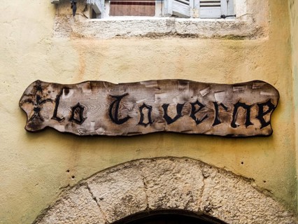 A wooden sign on a house wall in France Austria