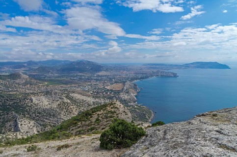 View of the seaside town from the slope of the mountain. Crimea