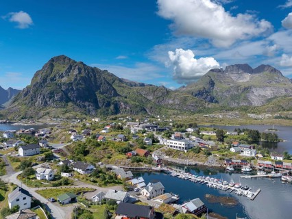 Aerial view, village scene in rugged landscape, Sorvagen, Lofoten, Norway, Europe
