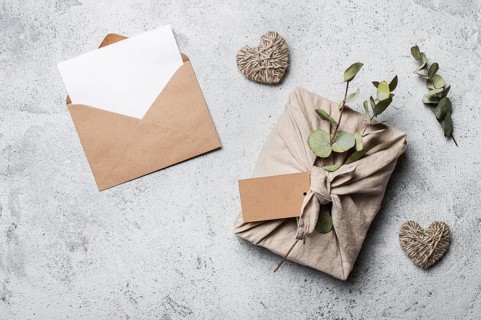 Zero waste Valentine's Day concept and mock up. Eco-friendly gift cloth wrapping in Furoshiki