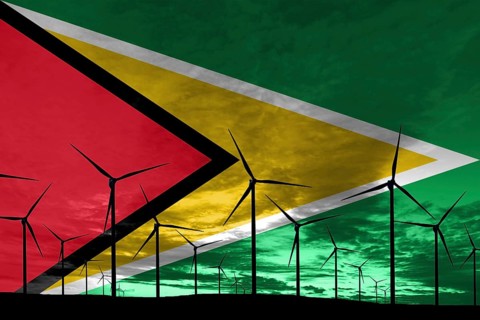 Guyana flag wind farm at sunset, sustainable development, renewable energy Wind Turbines