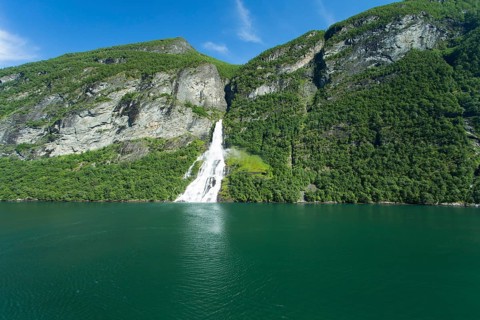 Image shows a waterfall in Geiranger ford in norway