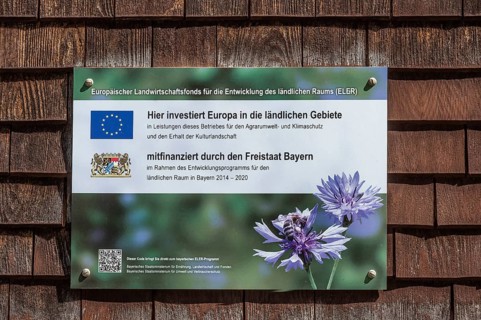 Wooden shingle wall with information sign, agricultural fund, near Niedersonthofen, Allgäu, Swabia,