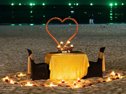 Table and chairs, illuminated and decorated, romantic, Chenang Beach, Langkawi, Kedah State,