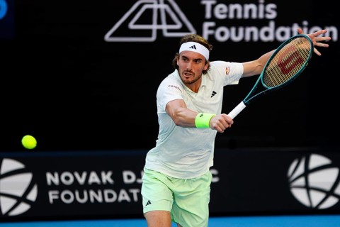 MELBOURNE, AUSTRALIA, JANUARY 11: Stefanos Tsitsipas of Greece plays against Novak Djokovic of