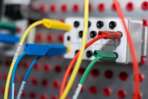 Close-up of a control circuit with coloured cables