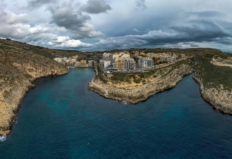Drone view of Xlendi village and bay on Gozo Island in Malta